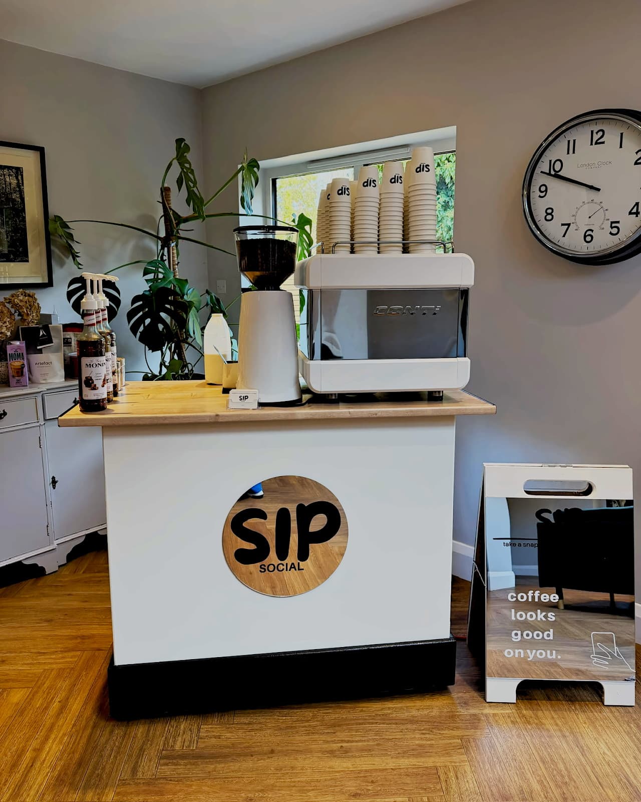 The Sip Social mobile coffee cart, set up and ready to serve