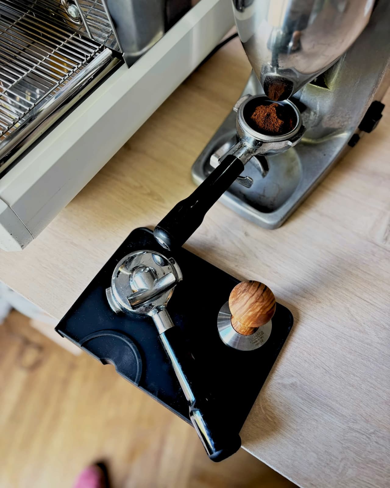 Portafilter and tamper on the Sip Social cart